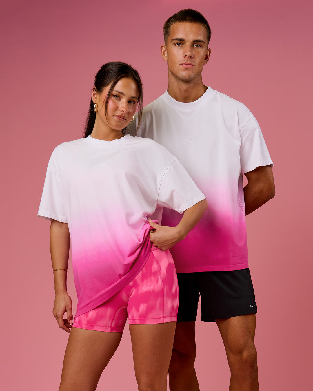 Duo wearing BCAM Ombre Heavyweight FLXCotton Oversized Tee  - White-Ultra Pink | Model:Bianca | Size:S | Model:Albert | Size:M - view 1