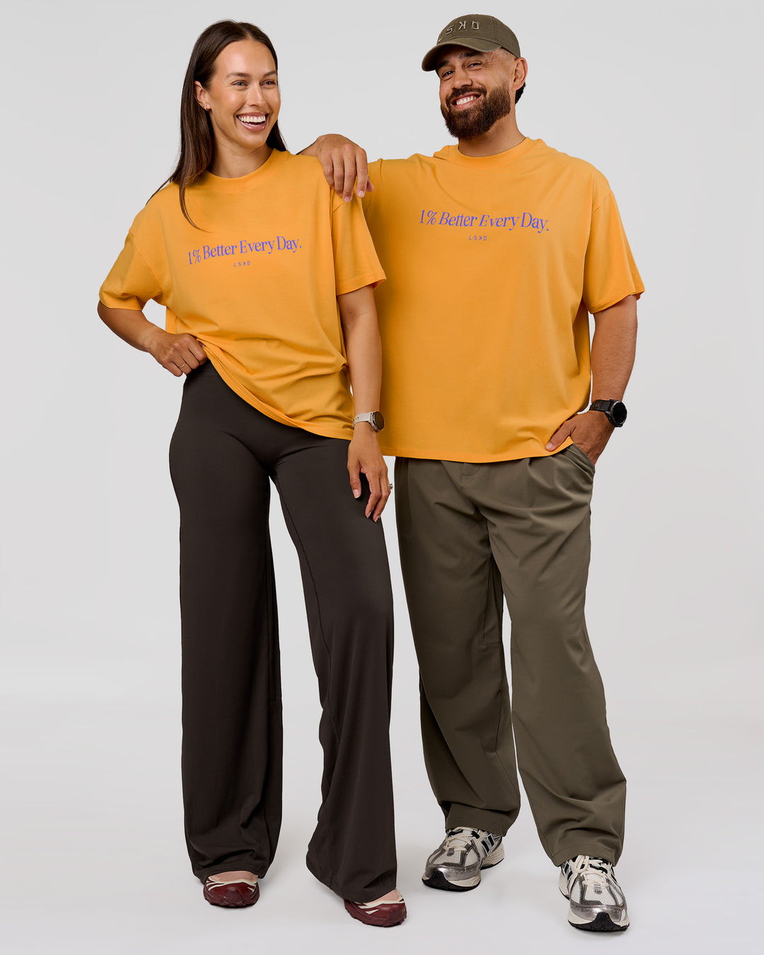 Duo wearing VS6 1% Better Fathers Day FLXCotton Oversized Tee - Warm Apricot | Model:Jess | Size:S | Model:Jordan | Size:XL - view 4