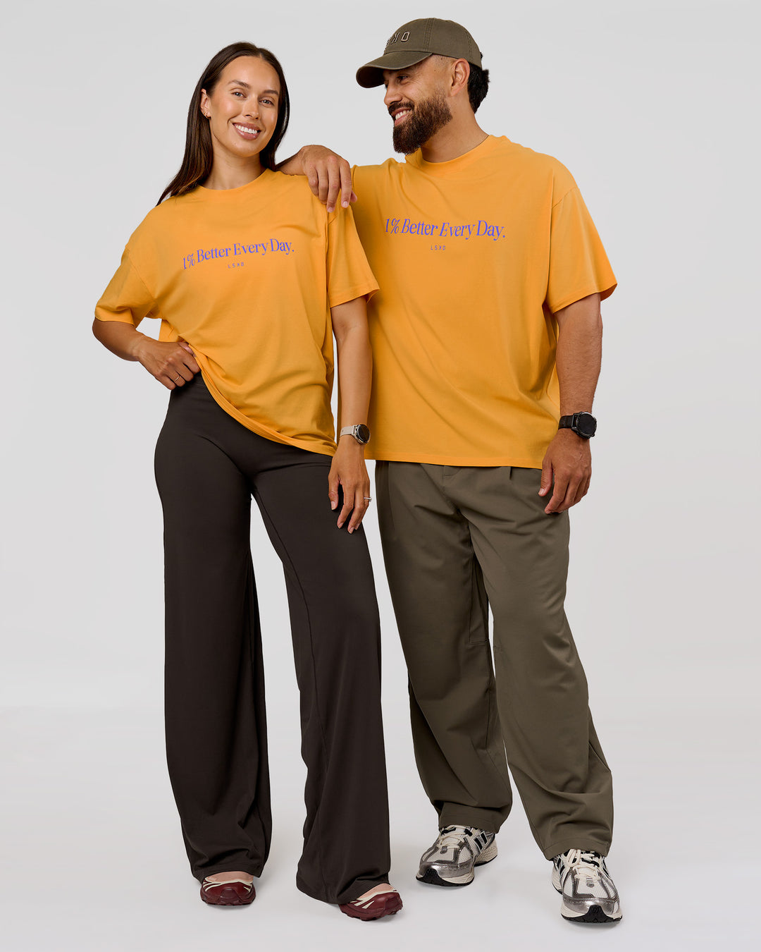 Duo wearing VS6 1% Better Fathers Day FLXCotton Oversized Tee - Warm Apricot | Model:Jess | Size:S | Model:Jordan | Size:XL - view 10