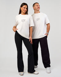 Duo wearing Andrew J. Steel x LSKD Heavyweight FLXCotton Oversized Tee - White | Model:Bianca | Size:XS | Model:Jaiden | Size:L | Thumbnail Index: 5