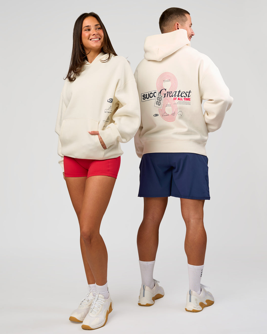 Duo wearing Greatest of All Time Heavyweight Oversized Hoodie - Off White | Model:Bianca | Size:XS | Model:Jaiden | Size:L - view 2