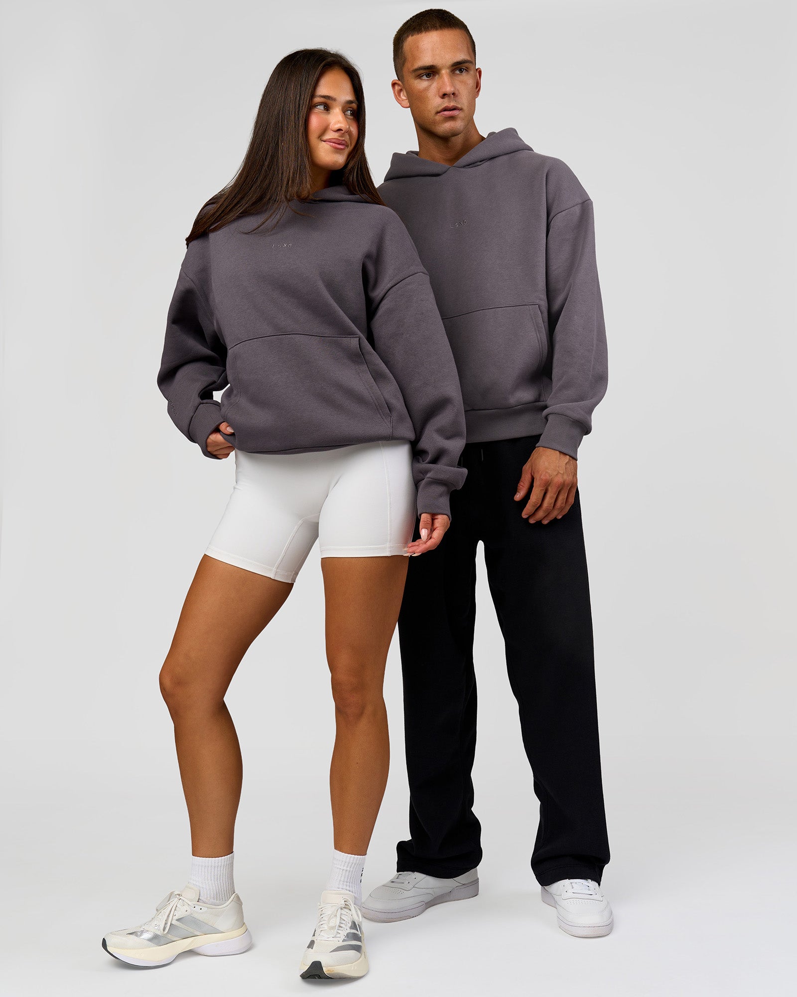 Duo wearing Base Oversized Hoodie - Duskstone | Model:Bianca | Size:XS | Model:Albert | Size:M
