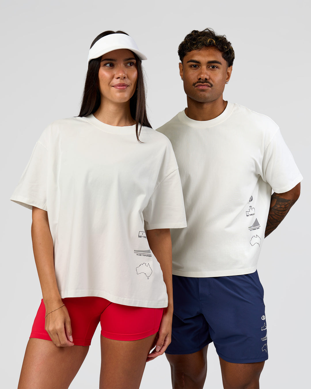 Duo wearing Greatest of All Time Heavyweight FLXCotton Boxed Tee - Off White Washed | Model:Rhiley| Size:XS | Model:Xav | Size:L - view 1