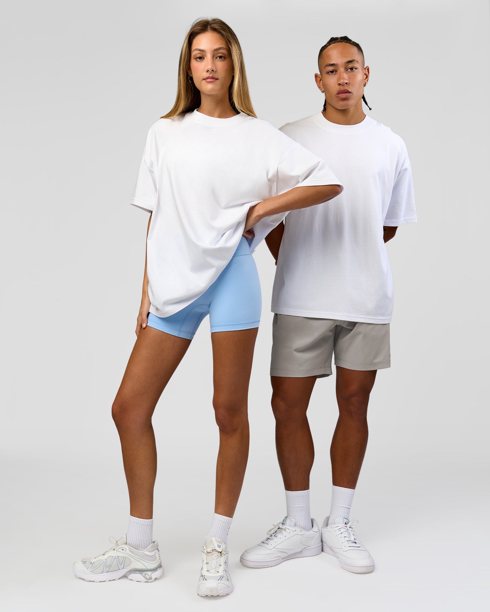 Duo wearing Strong is Beautiful Heavyweight Oversized Tee - White | Model:Georgia | Size:XS | Model:Malebo | Size:M