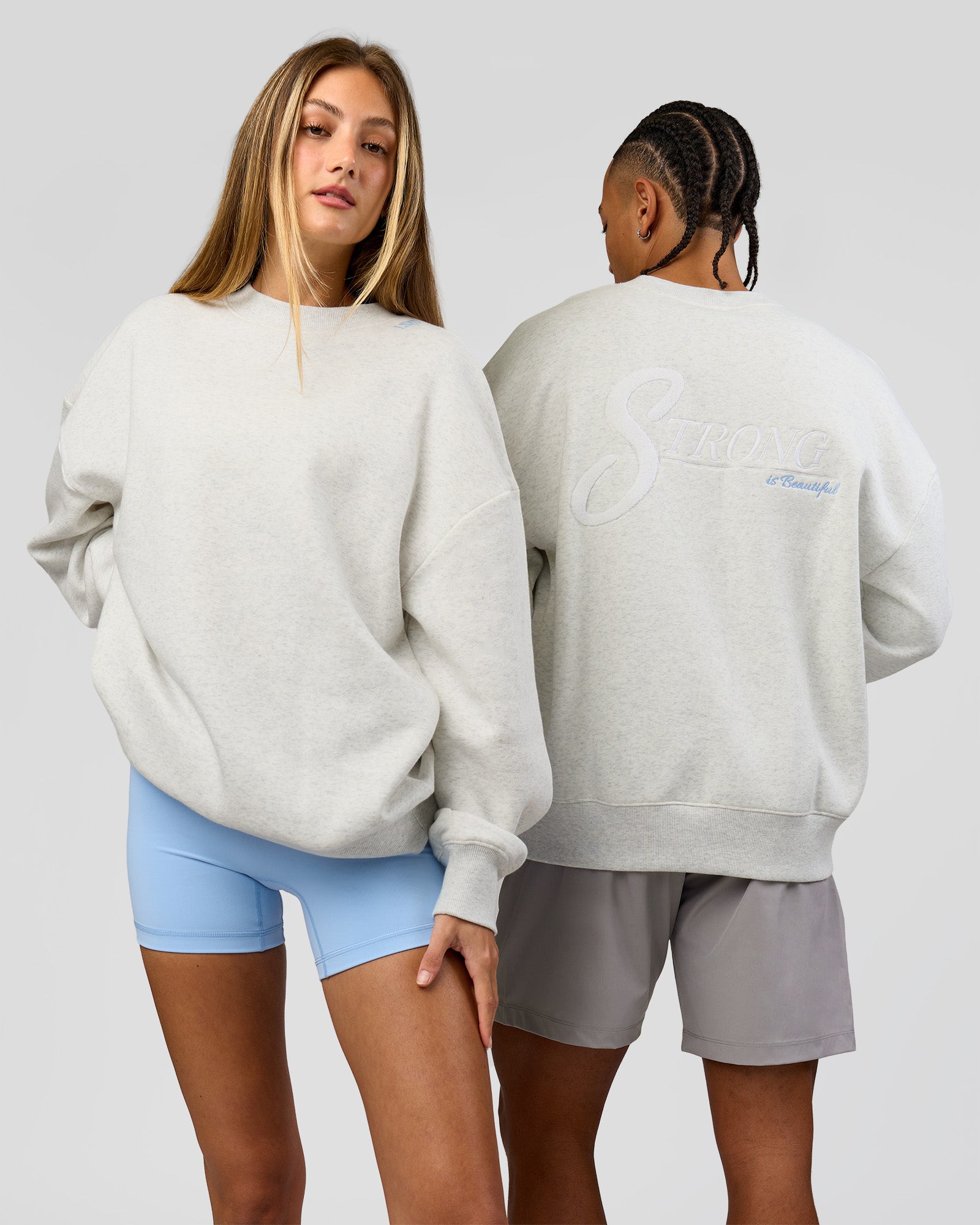 Duo wearing Strong is Beautiful Oversized Sweater - Silver Marl | Model:Georgia | Size:XS | Model:Malebo | Size:M