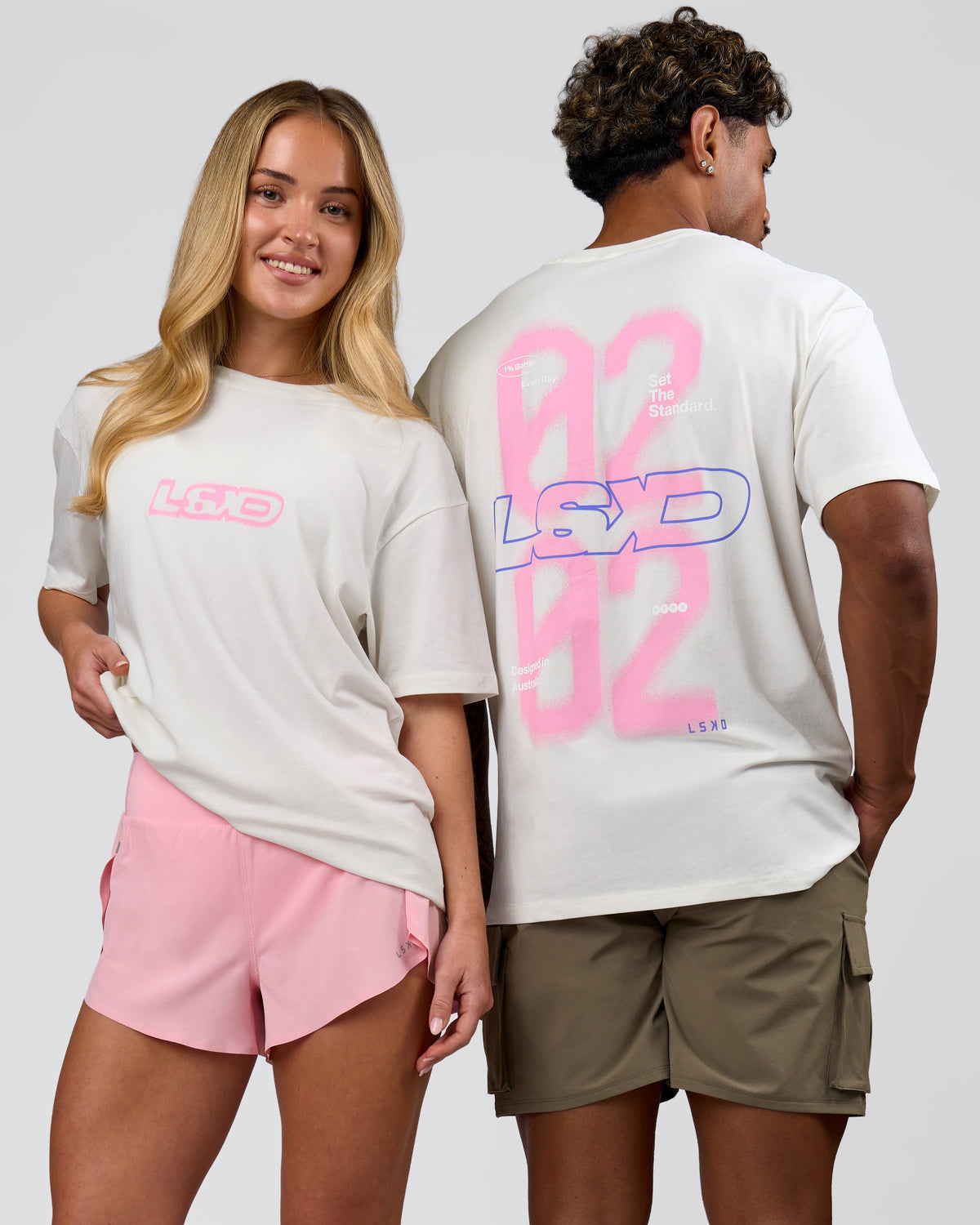 Duo wearing SoCal 26 FLXCotton Oversize Tee  - Off White-Pink Rose | Model:Issy | Size:XS | Model:Xav | Size:L