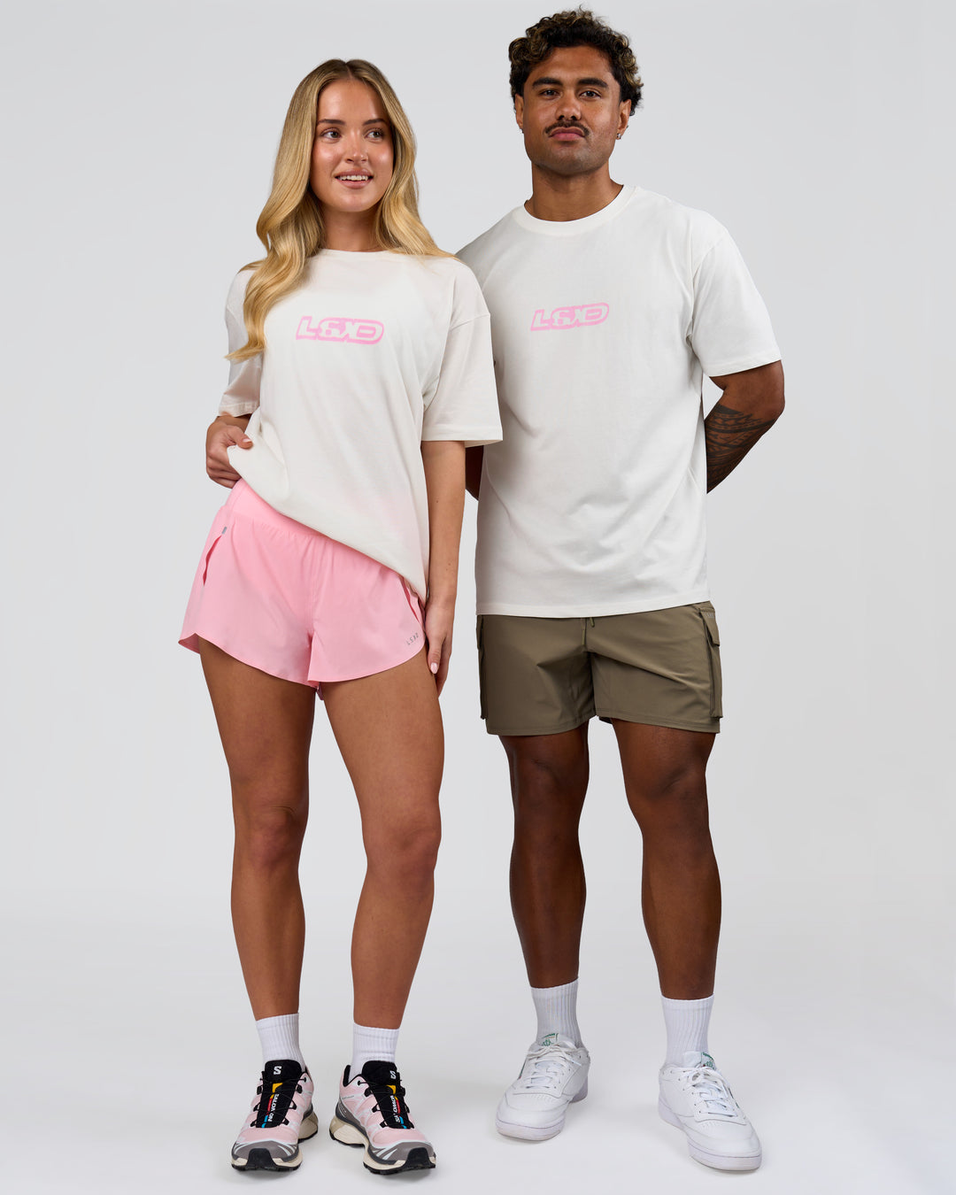Duo wearing SoCal 26 FLXCotton Oversize Tee  - Off White-Pink Rose | Model:Issy | Size:XS | Model:Xav | Size:L - view 4