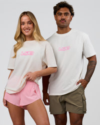 Duo wearing SoCal 26 FLXCotton Oversize Tee  - Off White-Pink Rose | Model:Issy | Size:XS | Model:Xav | Size:L | Thumbnail Index: 6