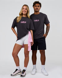 Duo wearing SoCal 26 FLXCotton Oversize Tee  - Onyx-Pink Rose | Model:Issy | Size:XS | Model:Xav | Size:L | Thumbnail Index: 3