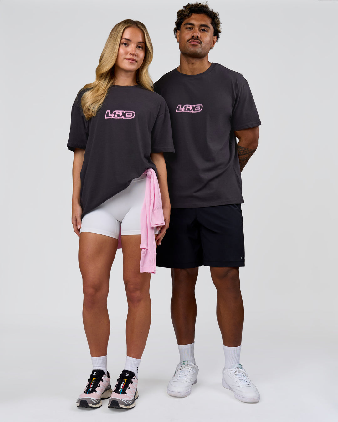 Duo wearing SoCal 26 FLXCotton Oversize Tee  - Onyx-Pink Rose | Model:Issy | Size:XS | Model:Xav | Size:L - view 10