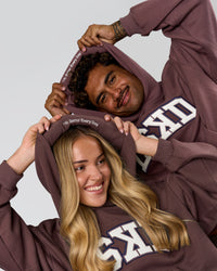 Duo wearing Varsity Boxy Hoodie - Cocoa Powder-Off White | Model:Issy | Size:XS | Model:Xav | Size:L | Thumbnail Index: 2
