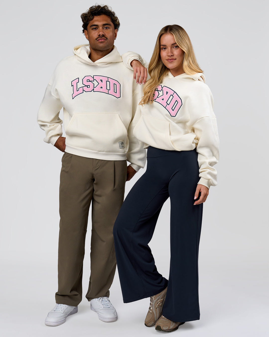 Duo wearing Varsity Boxy Hoodie - Off White-Pink Rose | Model:Issy | Size:XS | Model:Xav | Size:L - view 3