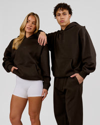 Duo wearing Base Oversized Hoodie - Ground Coffee | Model:Issy | Size:XS | Model:Leandro | Size:M | Thumbnail Index: 2