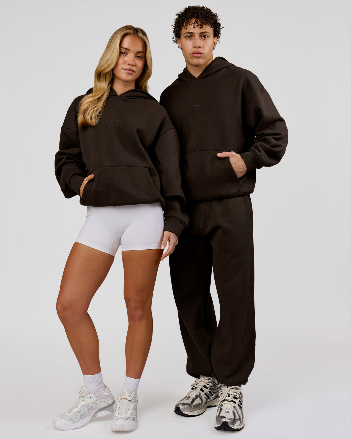Duo wearing Base Oversized Hoodie - Ground Coffee | Model:Issy | Size:XS | Model:Leandro | Size:M