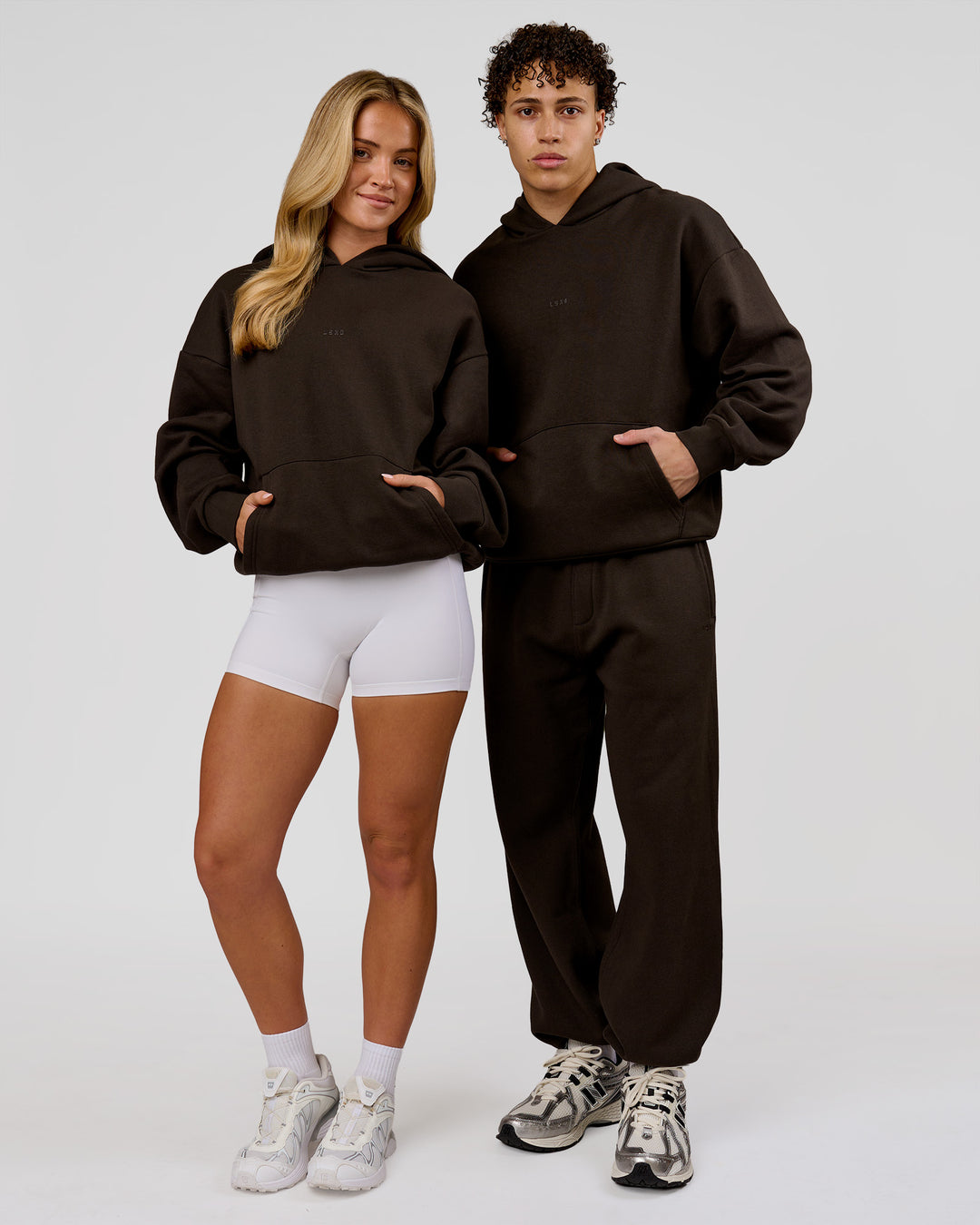 Duo wearing Base Oversized Hoodie - Ground Coffee | Model:Issy | Size:XS | Model:Leandro | Size:M - view 5