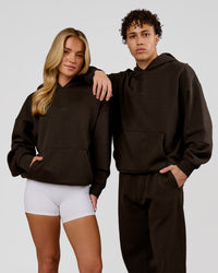 Duo wearing Base Oversized Hoodie - Ground Coffee | Model:Issy | Size:XS | Model:Leandro | Size:M | Thumbnail Index: 0