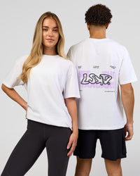 Duo wearing Benchmark FLXCotton Oversized Tee - White-Pale Lilac | Model:Issy | Size:XS | Model:Leandro | Size:M | Thumbnail Index: 0