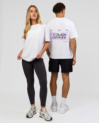 Duo wearing Benchmark FLXCotton Oversized Tee - White-Pale Lilac | Model:Issy | Size:XS | Model:Leandro | Size:M | Thumbnail Index: 6