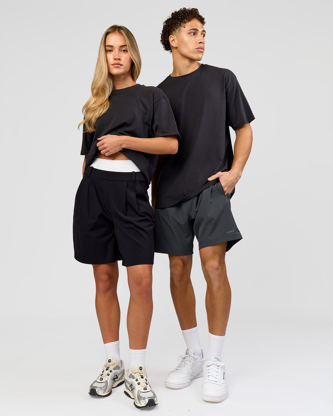 Duo wearing Benchmark FLXCotton Oversized Tee - Onyx-Yellow Fizz | Model:Issy | Size:XS | Model:Leandro | Size:M - view 5