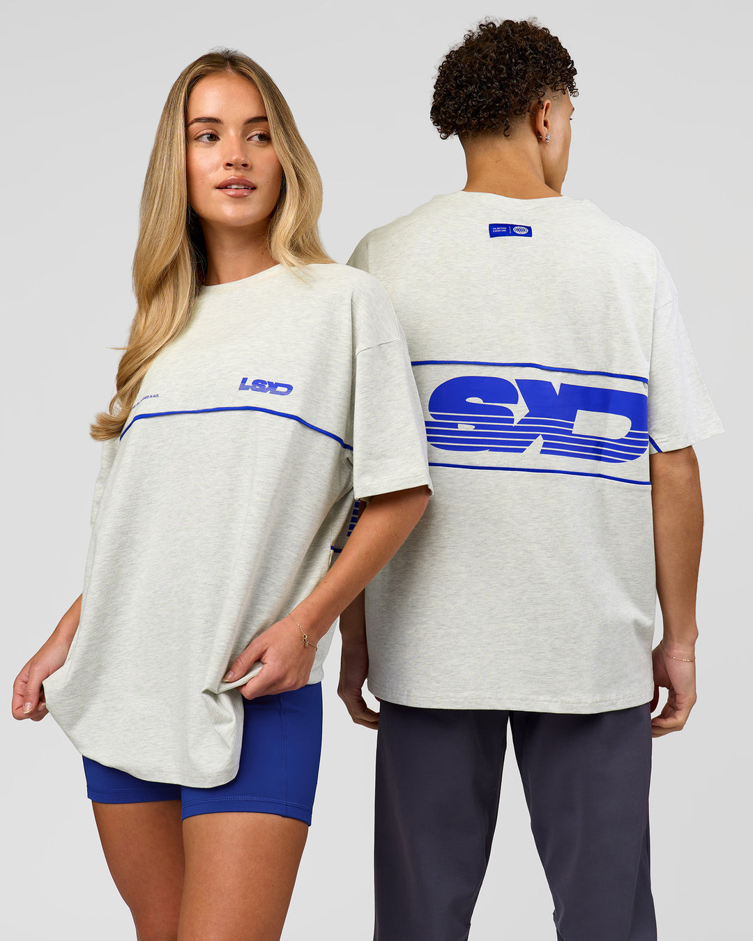 Duo wearing Inline Heavyweight FLXCotton Oversized Tee - Silver Marl-Power Cobalt | Model:Issy | Size:XS | Model:Leandro | Size:M - view 1