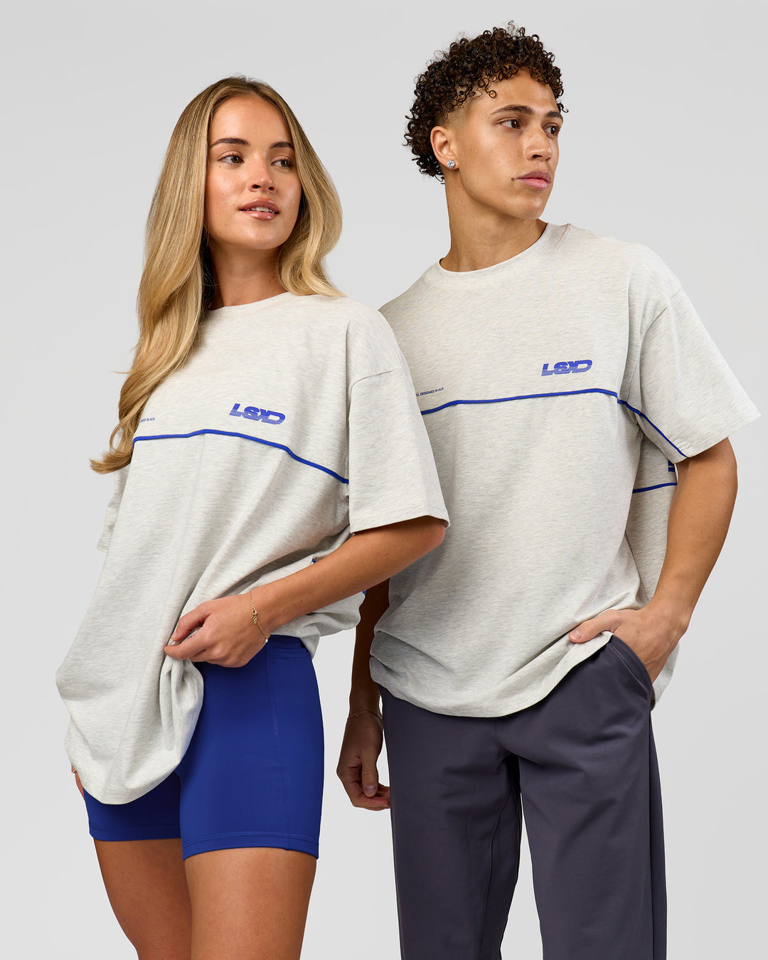 Duo wearing Inline Heavyweight FLXCotton Oversized Tee - Silver Marl-Power Cobalt | Model:Issy | Size:XS | Model:Leandro | Size:M - view 2