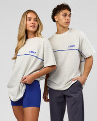 Duo wearing Inline Heavyweight FLXCotton Oversized Tee - Silver Marl-Power Cobalt | Model:Issy | Size:XS | Model:Leandro | Size:M | Thumbnail Index: 1