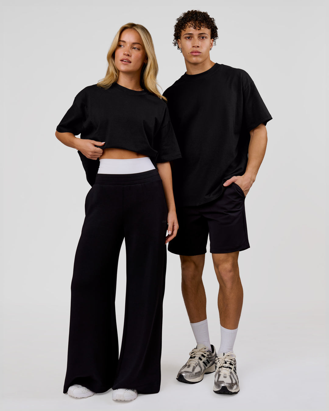 Duo wearing Shadow Mark Heavyweight Oversized Tee - Black-Onyx | Model:Issy | Size:XS | Model:Leandro | Size:M - view 7