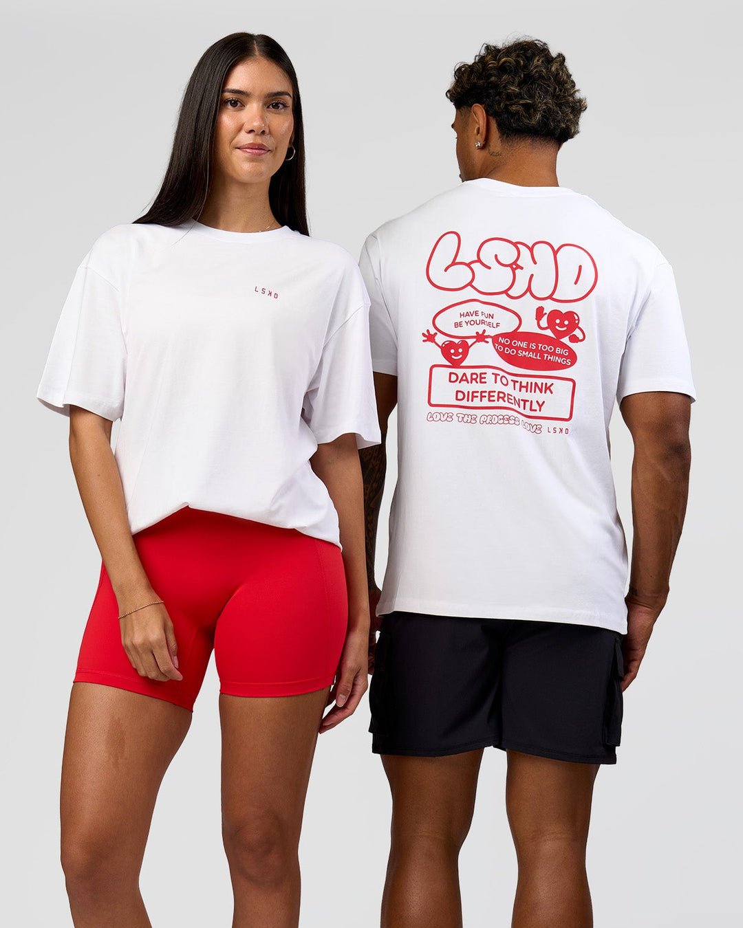Duo wearing Dare To Think FLXCotton Tee Oversize - White-Scarlet | Model:Rhiley | Size:XS | Model:Xav | Size:L - view 1