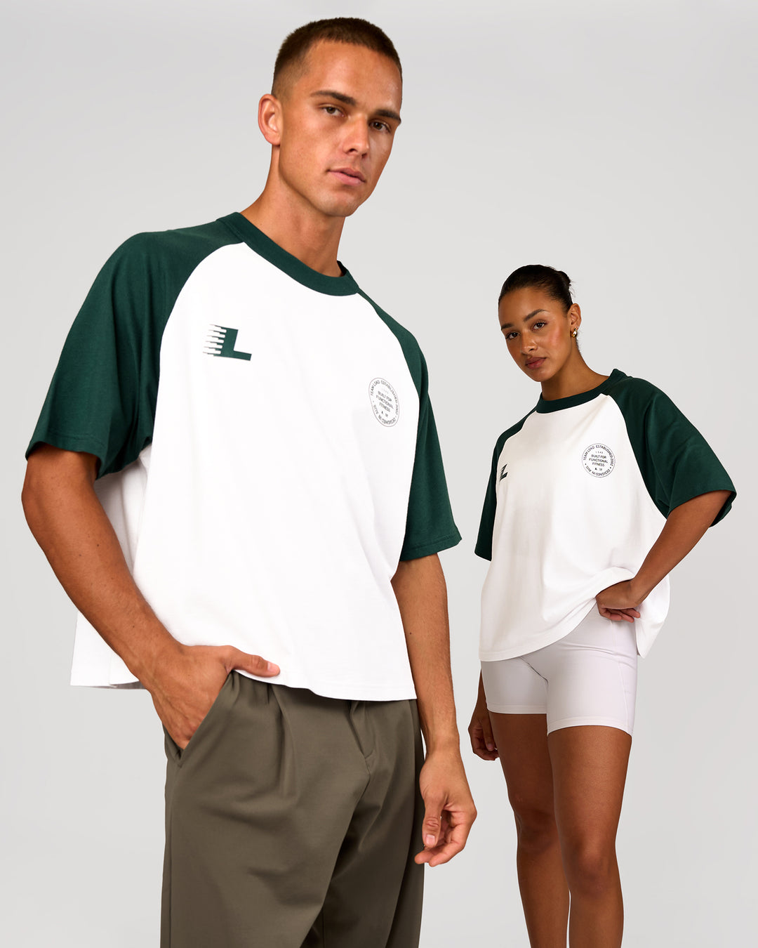 Duo wearing Victory Heavyweight Boxed Raglan Tee - White-Midnight Green | Model:Rosie | Size:XS | Model:Albert | Size:M - view 4
