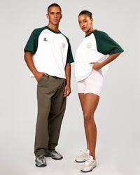 Duo wearing Victory Heavyweight Boxed Raglan Tee - White-Midnight Green | Model:Rosie | Size:XS | Model:Albert | Size:M | Thumbnail Index: 6