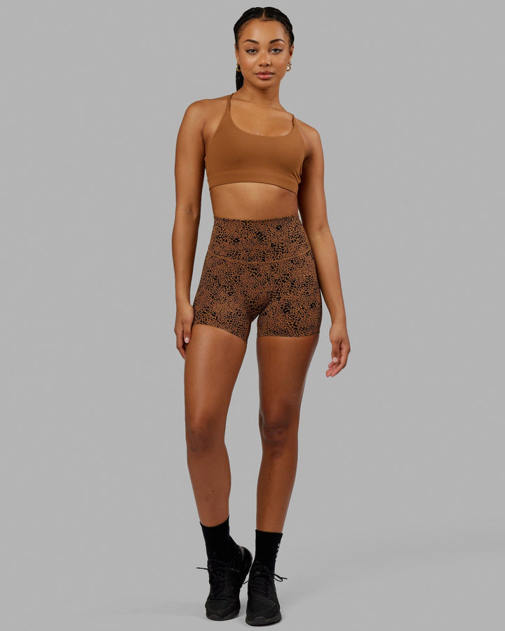 Woman wearing Elixir Sports Bra - Camel
