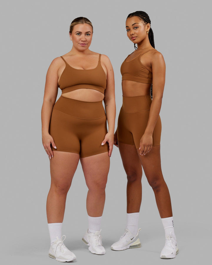 Woman wearing Elixir Sports Bra - Camel