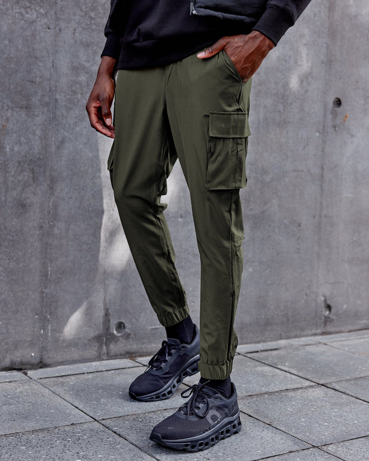 Man wearing Energy Stretch Performance Cargo Joggers - Forest Night
