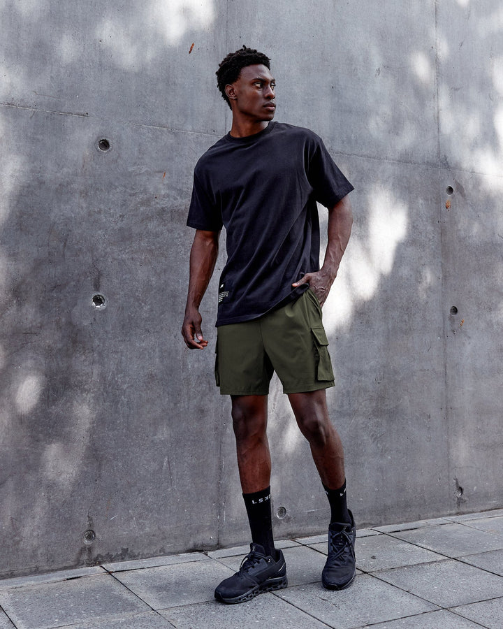 Man wearing Energy Stretch Performance Cargo Short - Forest Night