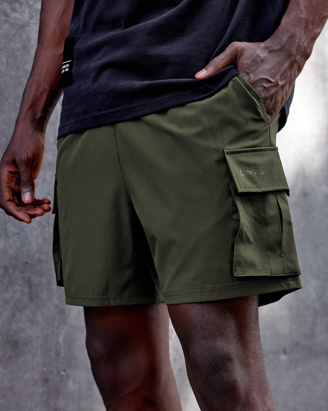 Man wearing Energy Stretch Performance Cargo Short - Forest Night