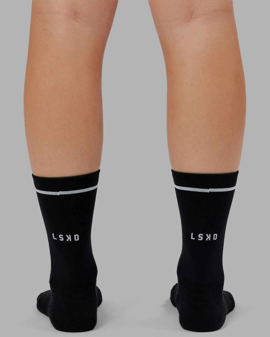 Model wearing Fast-Heritage-Signal Pack - Black/White-Galactic Lilac/Dark Moss Success | Size:OS