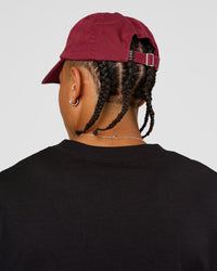 Man wearing All Day Cap - Cherry Lacquer | Model:Day | Size:ALL | Thumbnail Index: 1