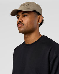 Man wearing Daily Cap - Taupe Ash | Model:Cap | Size:DAILY | Thumbnail Index: 0