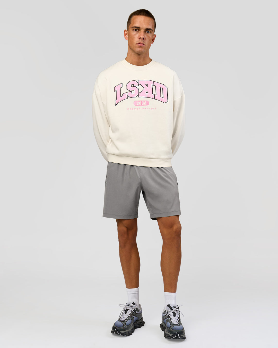 Man wearing Varsity Boxy Crew - Off White-Pink Rose | Model:Albert | Size:L