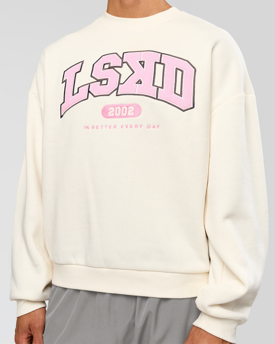 Man wearing Varsity Boxy Crew - Off White-Pink Rose | Model:Albert | Size:L