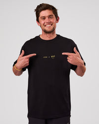 Man wearing TGHF X LSKD 26 FLXCotton Oversized Tee - Black | Model:Cooper | Size:L | Thumbnail Index: 2