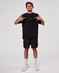 Man wearing TGHF X LSKD 26 FLXCotton Oversized Tee - Black | Model:Cooper | Size:L | Thumbnail Index: 10