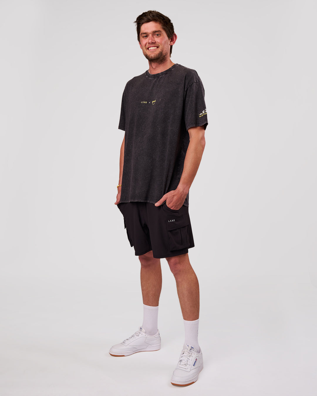 Man wearing TGHF X LSKD 26 FLXCotton Oversized Tee - Black Washed | Model:Cooper | Size:L - view 7