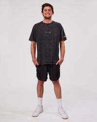 Man wearing TGHF X LSKD 26 FLXCotton Oversized Tee - Black Washed | Model:Cooper | Size:L | Thumbnail Index: 7