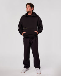 Man wearing TGHF X LSKD 26 Oversized Hoodie - Black | Model:Cooper | Size:L | Thumbnail Index: 12