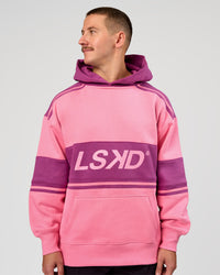 Man wearing A-Team Oversized Hoodie - Candy Pink-Boysenberry | Model:Jaiden | Size:L | Thumbnail Index: 1