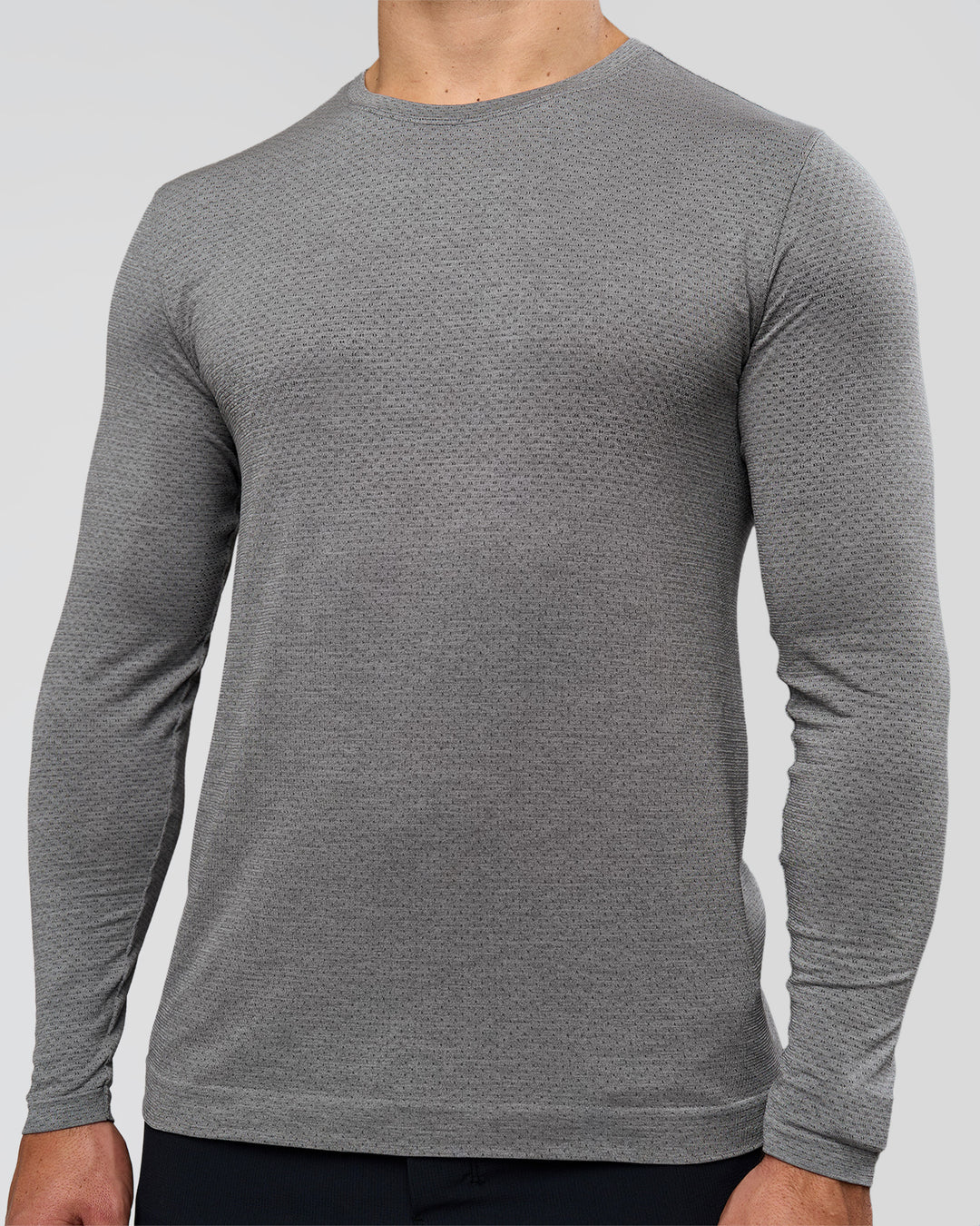 Man wearing AeroFLX+ Seamless Long Sleeve Tee (Set in Sleeve) - Dark Storm/Alloy | Model:Jaiden | Size:L - view 2