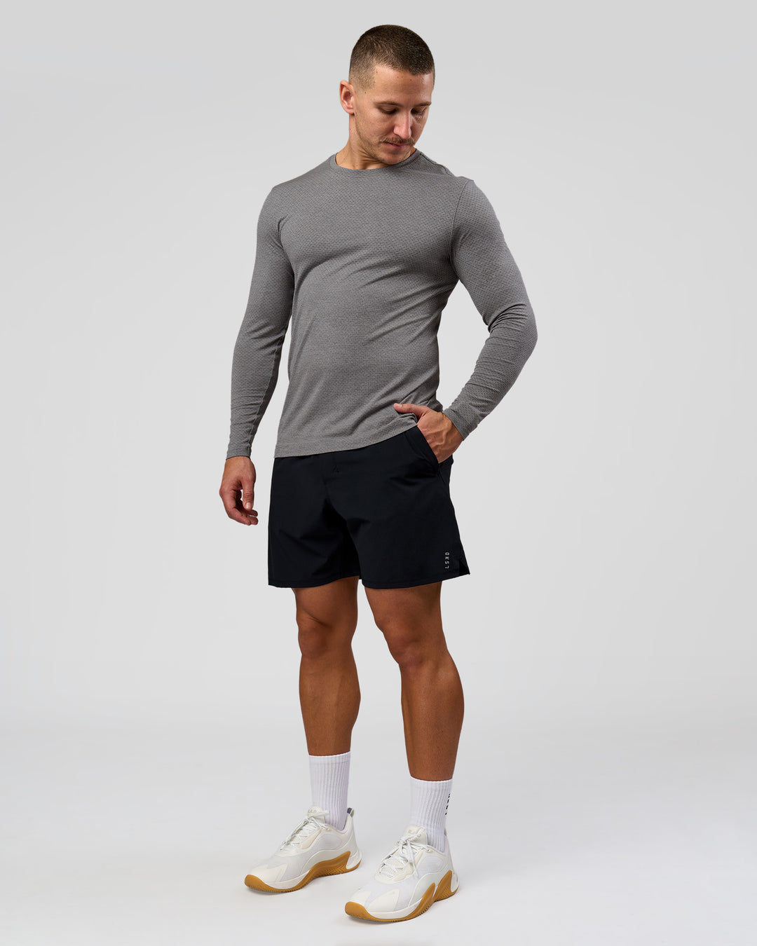 Man wearing AeroFLX+ Seamless Long Sleeve Tee (Set in Sleeve) - Dark Storm/Alloy | Model:Jaiden | Size:L - view 3
