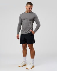 Man wearing AeroFLX+ Seamless Long Sleeve Tee (Set in Sleeve) - Dark Storm/Alloy | Model:Jaiden | Size:L | Thumbnail Index: 2