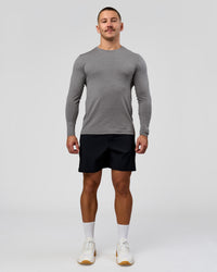 Man wearing AeroFLX+ Seamless Long Sleeve Tee (Set in Sleeve) - Dark Storm/Alloy | Model:Jaiden | Size:L | Thumbnail Index: 3